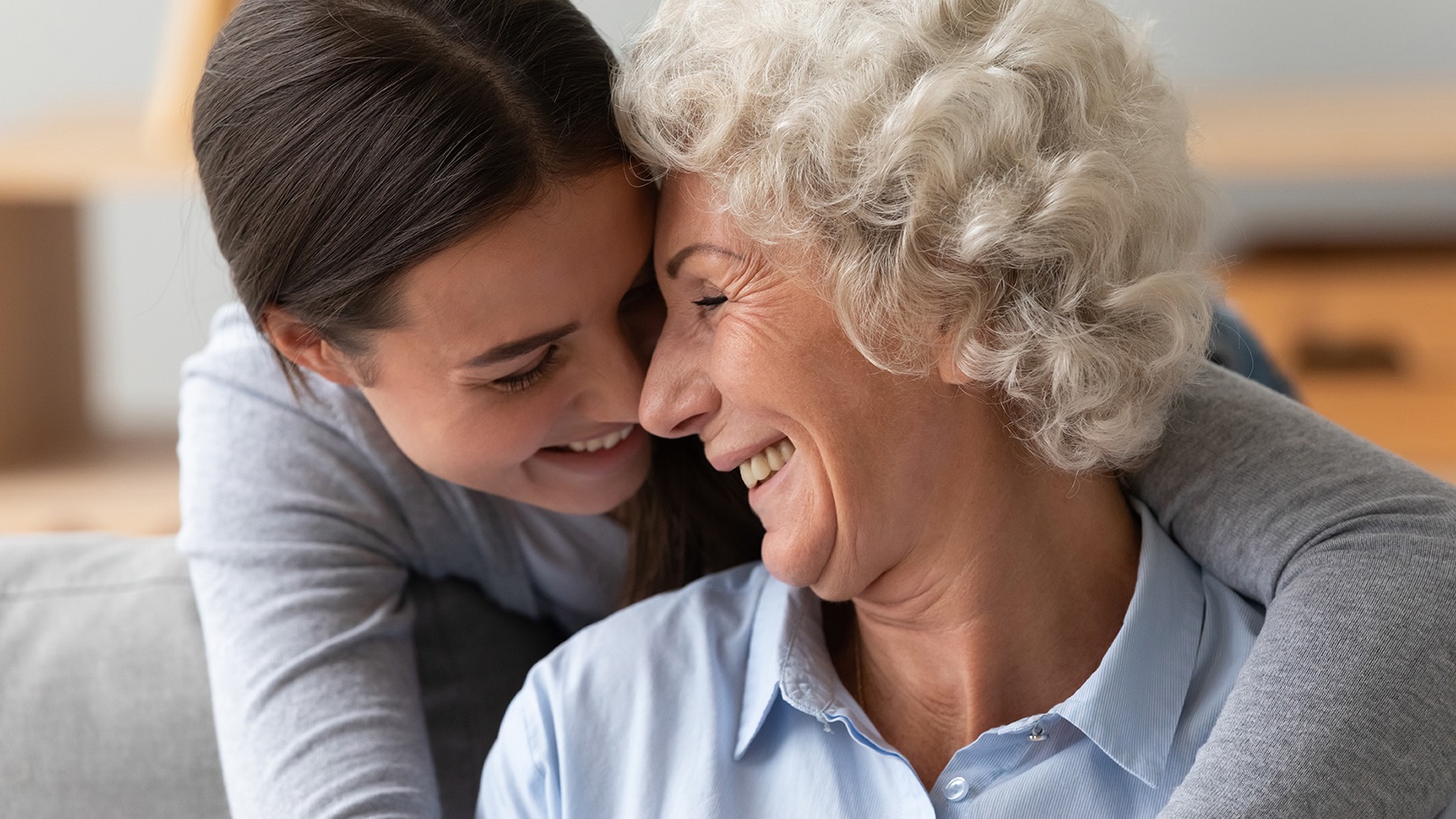 A caregiver sharing a moment with seniors